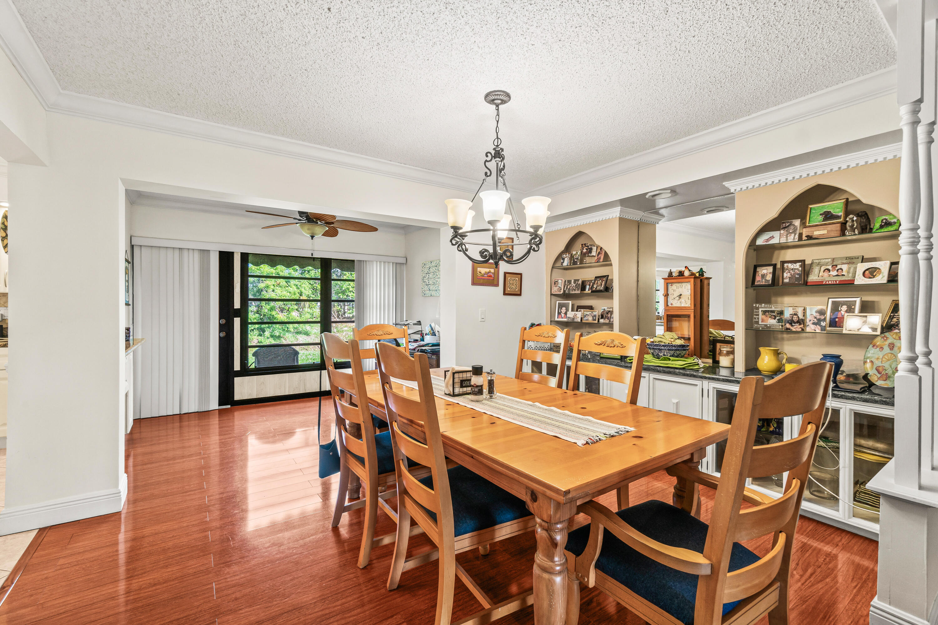 4863 Hawkwood Road, Unit B Boynton Beach, FL 33436 - Photo 7 of 23 a view of a dining room with furniture window and wooden floor