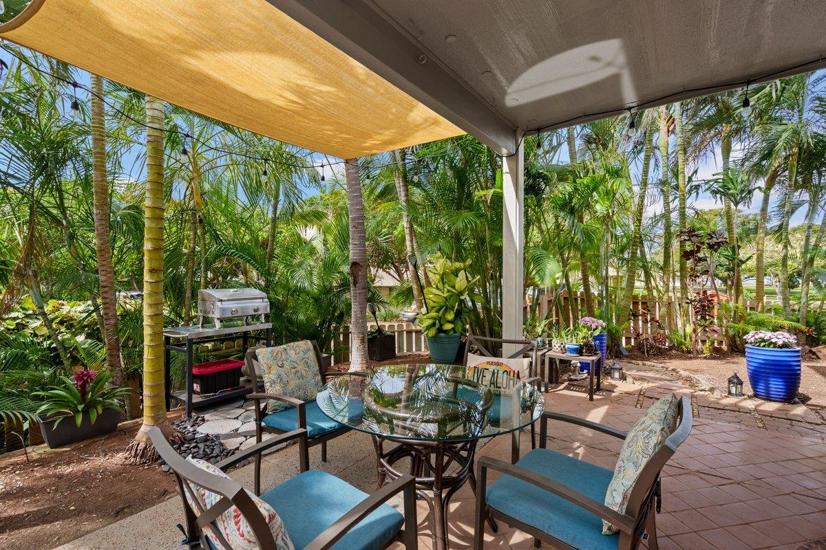 140 Uwapo Road, Unit 35102 Kihei, HI 96753 - Photo 12 of 30 a building outdoor space with patio furniture