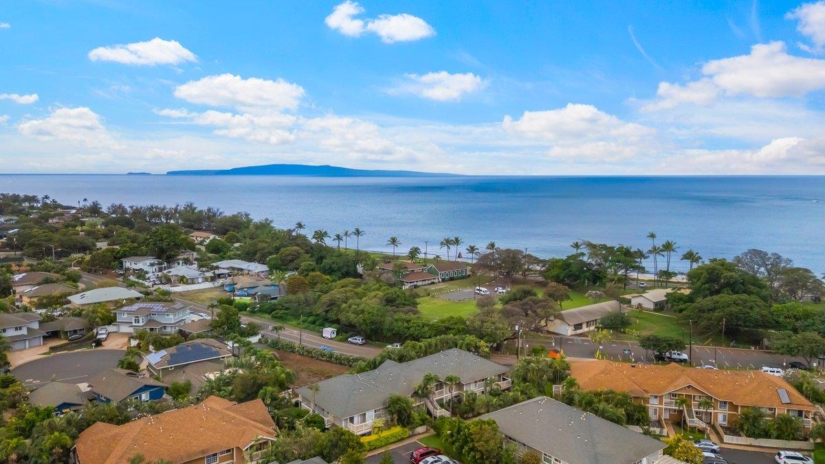 140 Uwapo Road, Unit 35102 Kihei, HI 96753 - Photo 13 of 30 an aerial view of multiple house