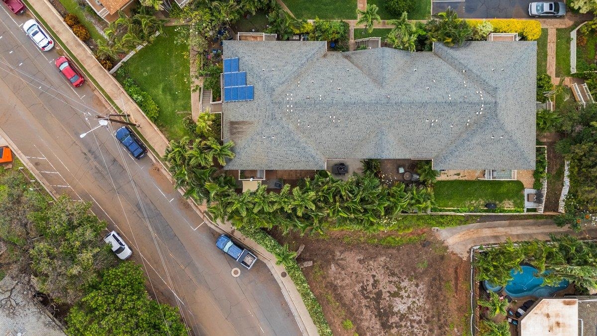 140 Uwapo Road, Unit 35102 Kihei, HI 96753 - Photo 15 of 30 an aerial view of a house with a yard