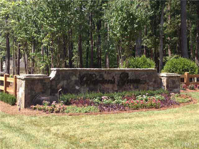 1108 Margarets Lane, Unit 4 Raleigh, NC 27614 - Photo 3 of 4 a view of a garden with plants and trees