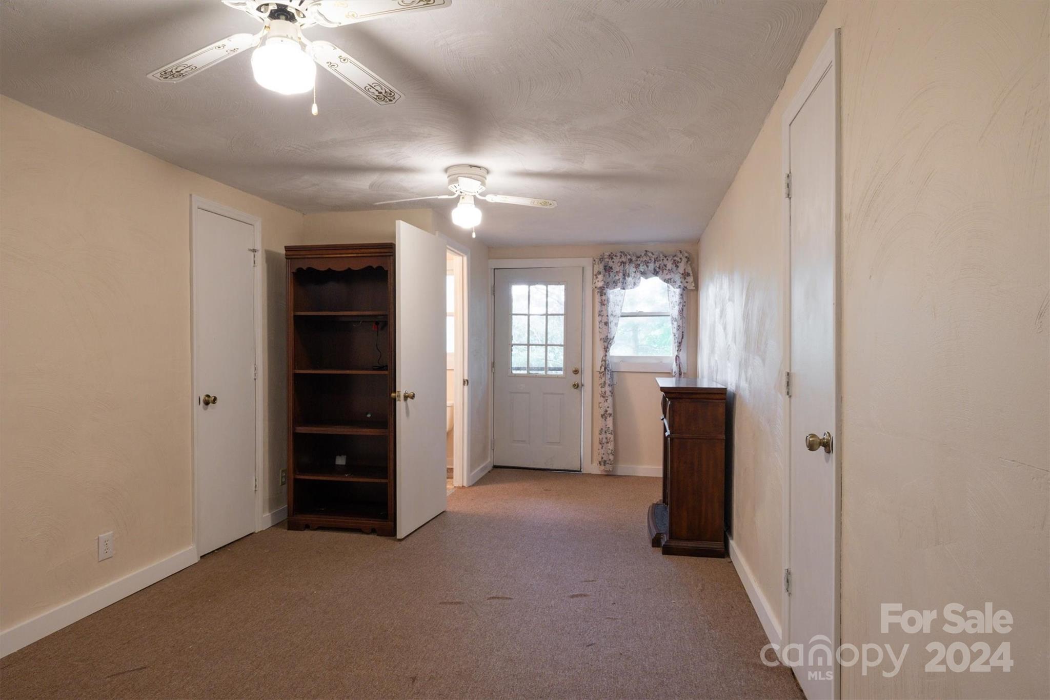 455 Hemlock Hill Road Boone, NC 28607 - Photo 21 of 37 wooden floor in an empty room with a window
