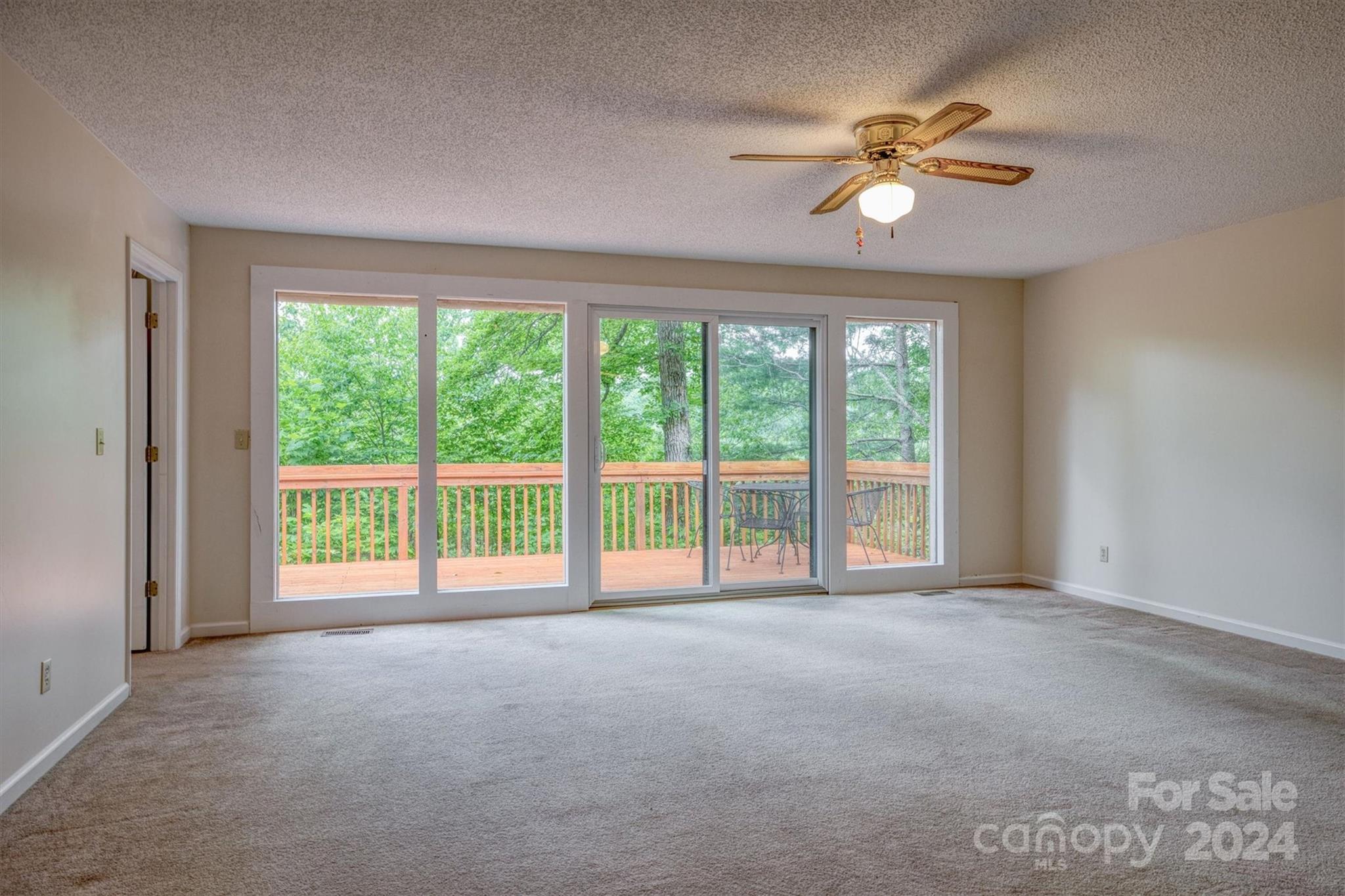 455 Hemlock Hill Road Boone, NC 28607 - Photo 29 of 37 a view of an empty room with a window