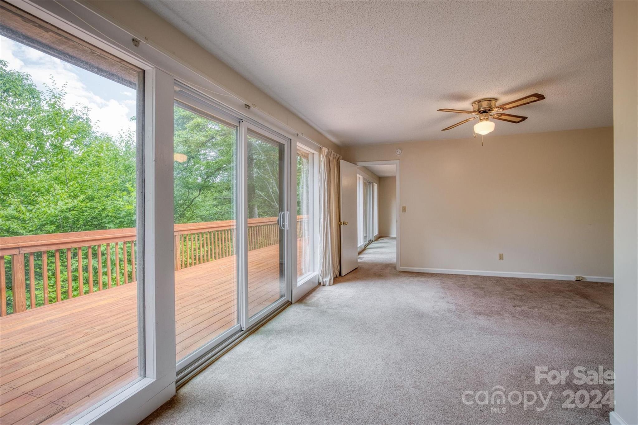 455 Hemlock Hill Road Boone, NC 28607 - Photo 35 of 37 a view of an empty room with a window