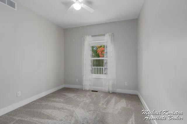 $479,900 | 122 Blue Violet Lane Northeast, Unit 99, Comstock Park, MI 49321