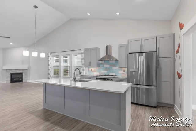 $479,900 | 122 Blue Violet Lane Northeast, Unit 99, Comstock Park, MI 49321