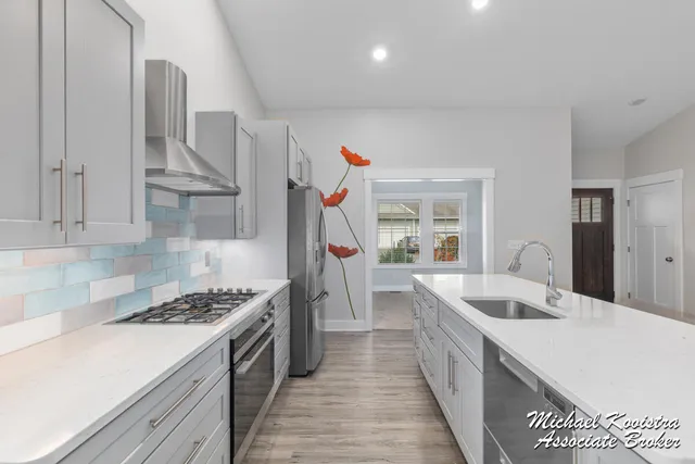 $479,900 | 122 Blue Violet Lane Northeast, Unit 99, Comstock Park, MI 49321