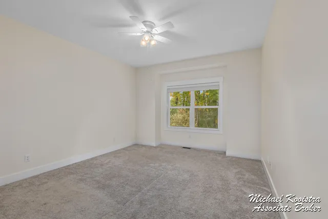 $479,900 | 122 Blue Violet Lane Northeast, Unit 99, Comstock Park, MI 49321