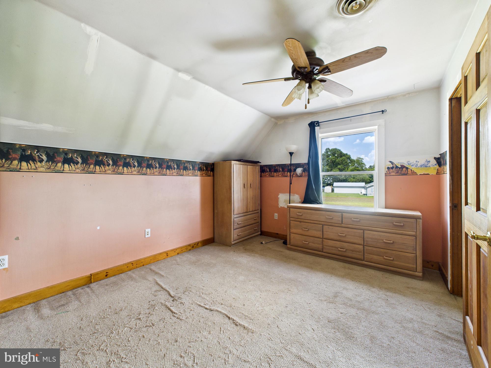 12502 Woodbridge Road Greenwood, DE 19950 - Photo 21 of 38 a view of room with window and ceiling fan