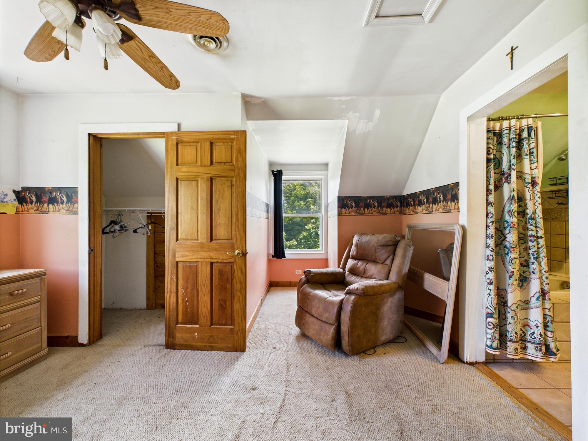 12502 Woodbridge Road Greenwood, DE 19950 - Photo 22 of 38 a living room with furniture and a large window