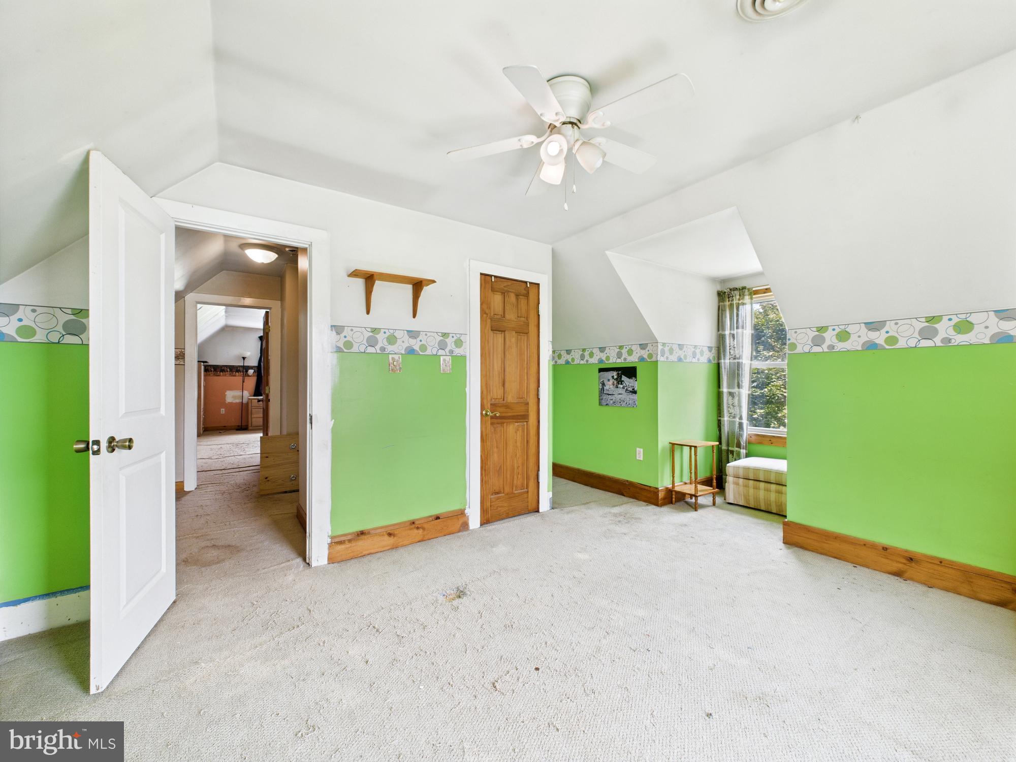 12502 Woodbridge Road Greenwood, DE 19950 - Photo 29 of 38 a view of an empty room with a window and a livingroom