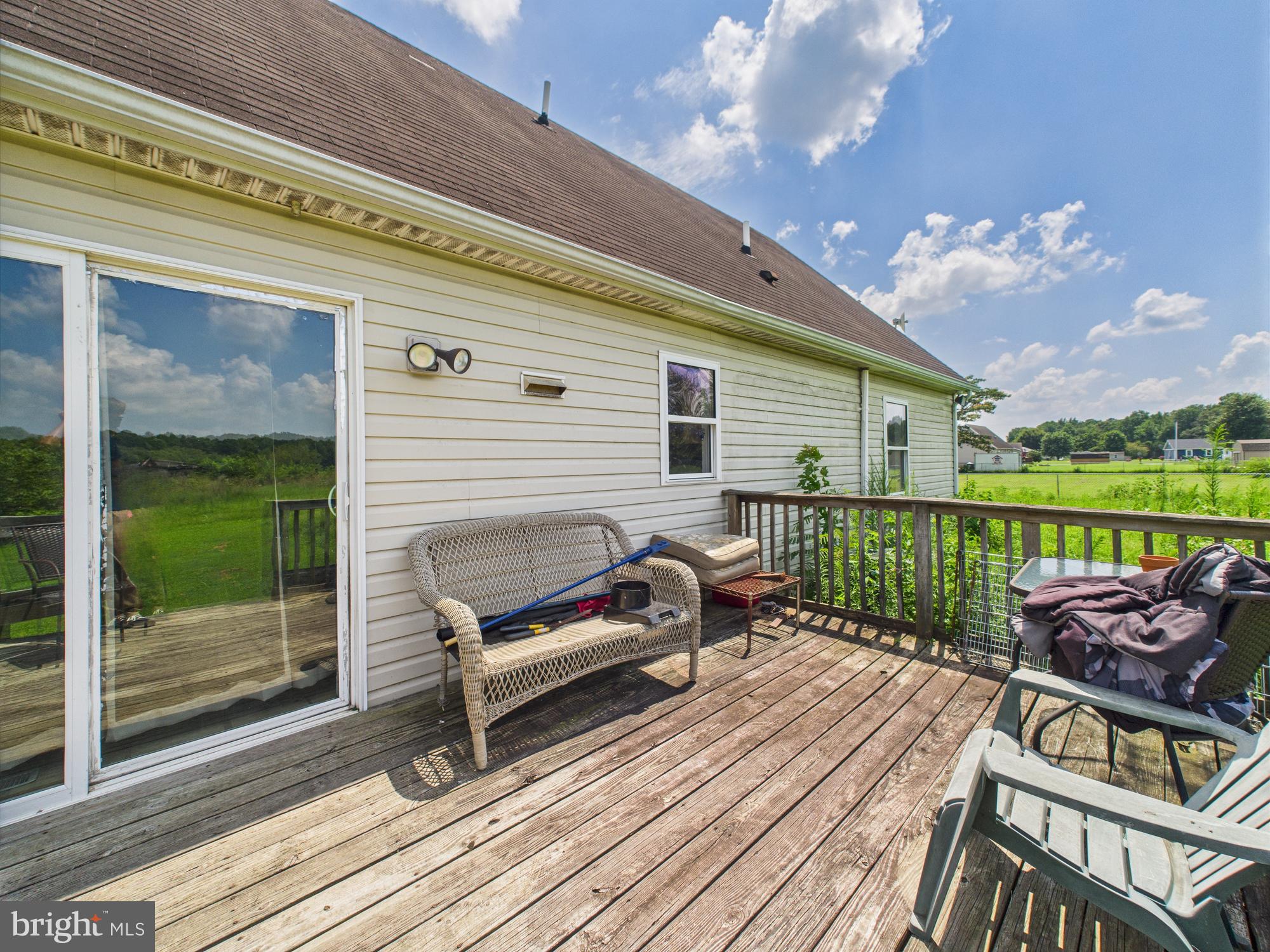 12502 Woodbridge Road Greenwood, DE 19950 - Photo 33 of 38 a balcony with furniture and garden view