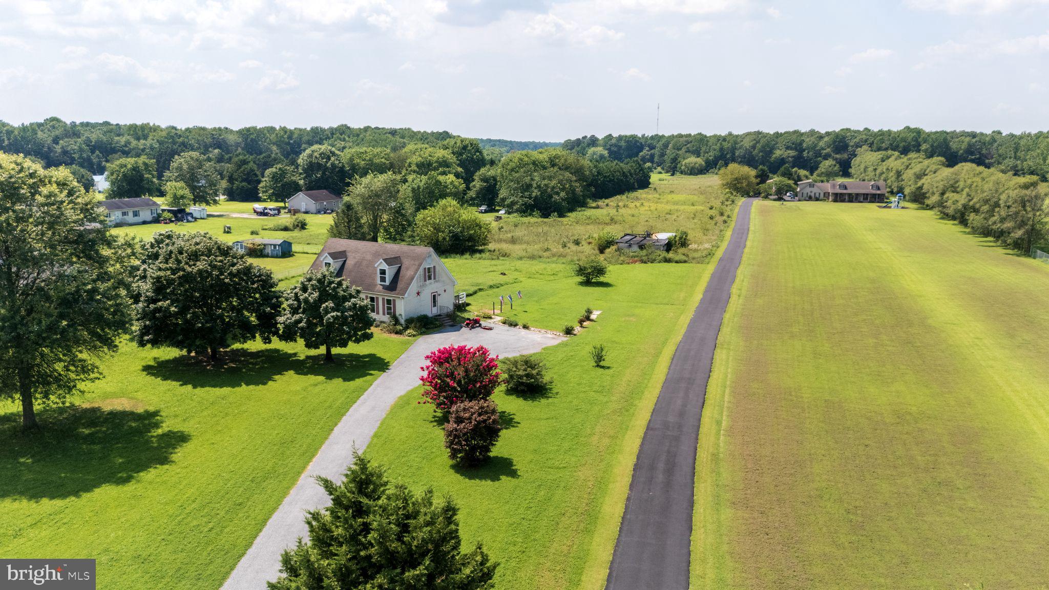 12502 Woodbridge Road Greenwood, DE 19950 - Photo 37 of 38 a view of a large body of water with a mountain view