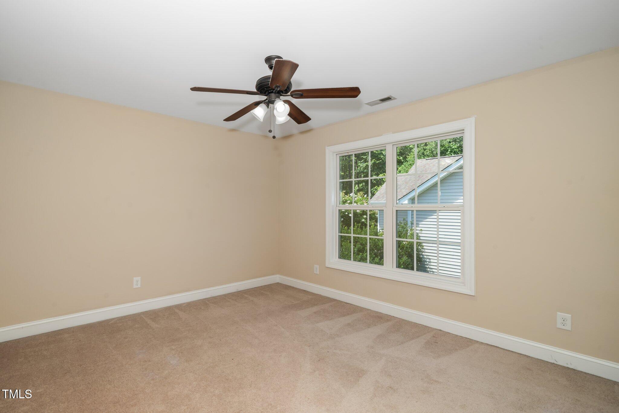 11612 Leesville Road Raleigh, NC 27613 - Photo 26 of 32 an empty room with a window