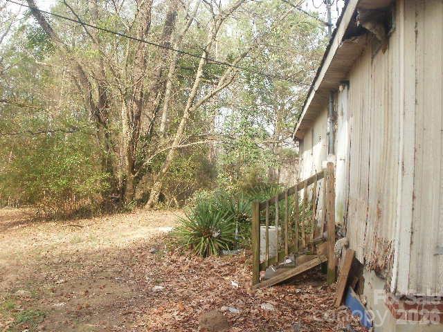 433 Parson Road Wadesboro, NC 28170 - Photo 4 of 20 a backyard of a house with lots of green space