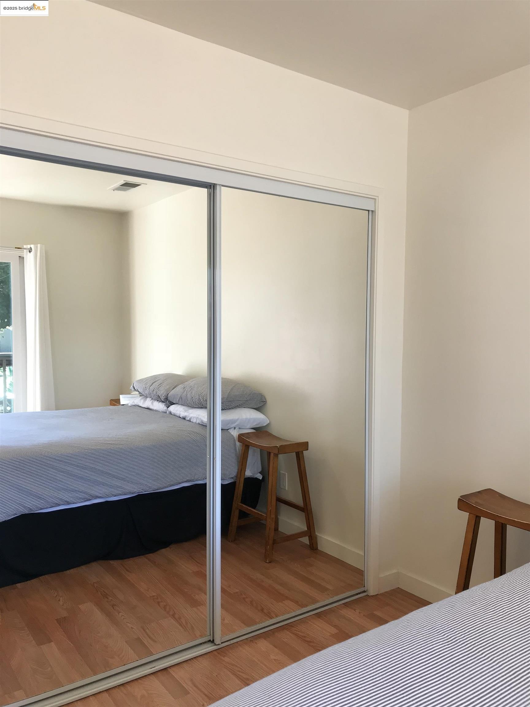 2408 Eighth Street Berkeley, CA 94710 - Photo 5 of 14 a bedroom with a bed and a window