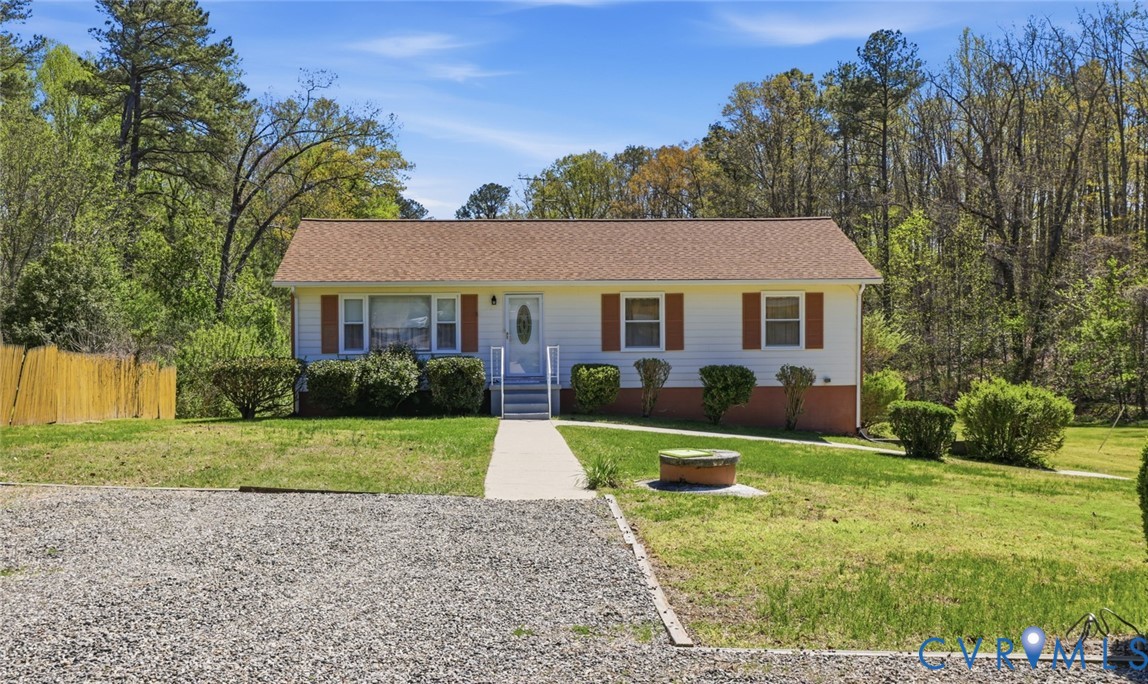 19353 Boulwares Road Ruther Glen, VA 22546 - Photo 1 of 62 Single story home with a front yard
