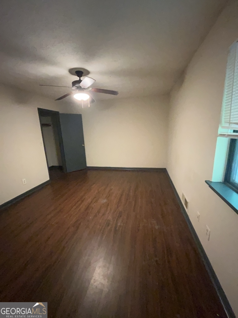 1265 Herrington Road Lawrenceville, GA 30044 - Photo 18 of 52 a view of empty room with wooden floor