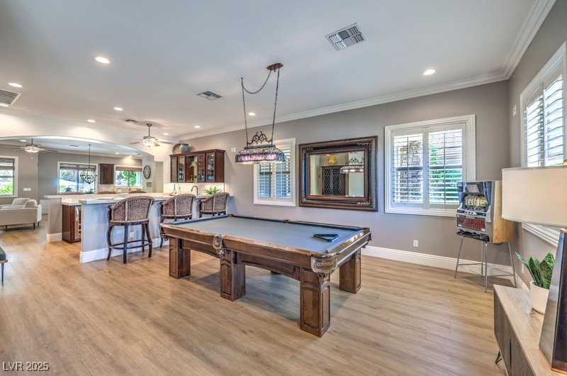 9135 Hickam Avenue Las Vegas, NV 89129 - Photo 23 of 75 Game room featuring a ceiling fan, ornamental molding, light wood-type flooring, recessed lighting, and billiards table