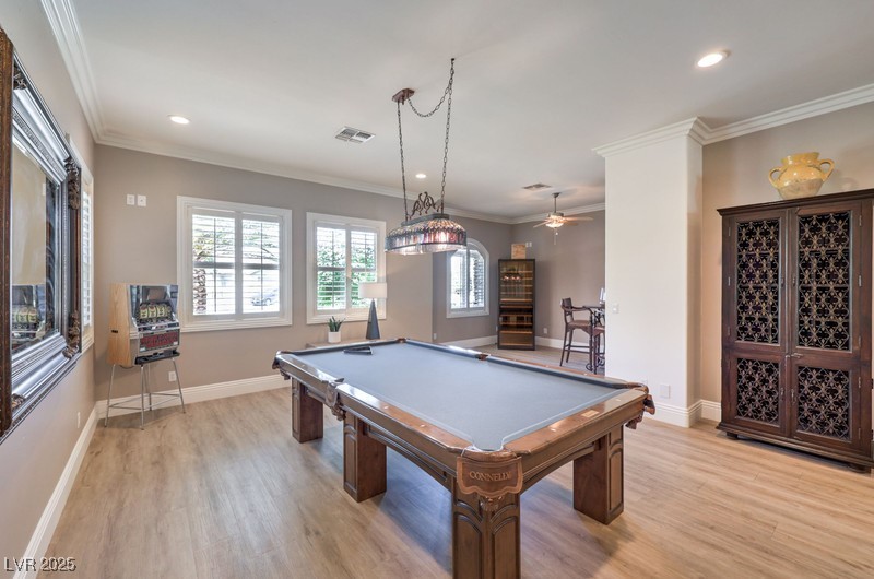 9135 Hickam Avenue Las Vegas, NV 89129 - Photo 24 of 75 Playroom featuring light wood-type flooring, billiards table, recessed lighting, crown molding, and a ceiling fan