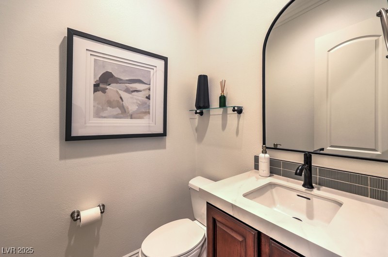 9135 Hickam Avenue Las Vegas, NV 89129 - Photo 27 of 75 Bathroom featuring toilet and vanity