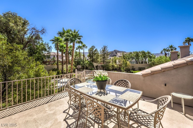 9135 Hickam Avenue Las Vegas, NV 89129 - Photo 52 of 75 View of patio featuring outdoor dining area