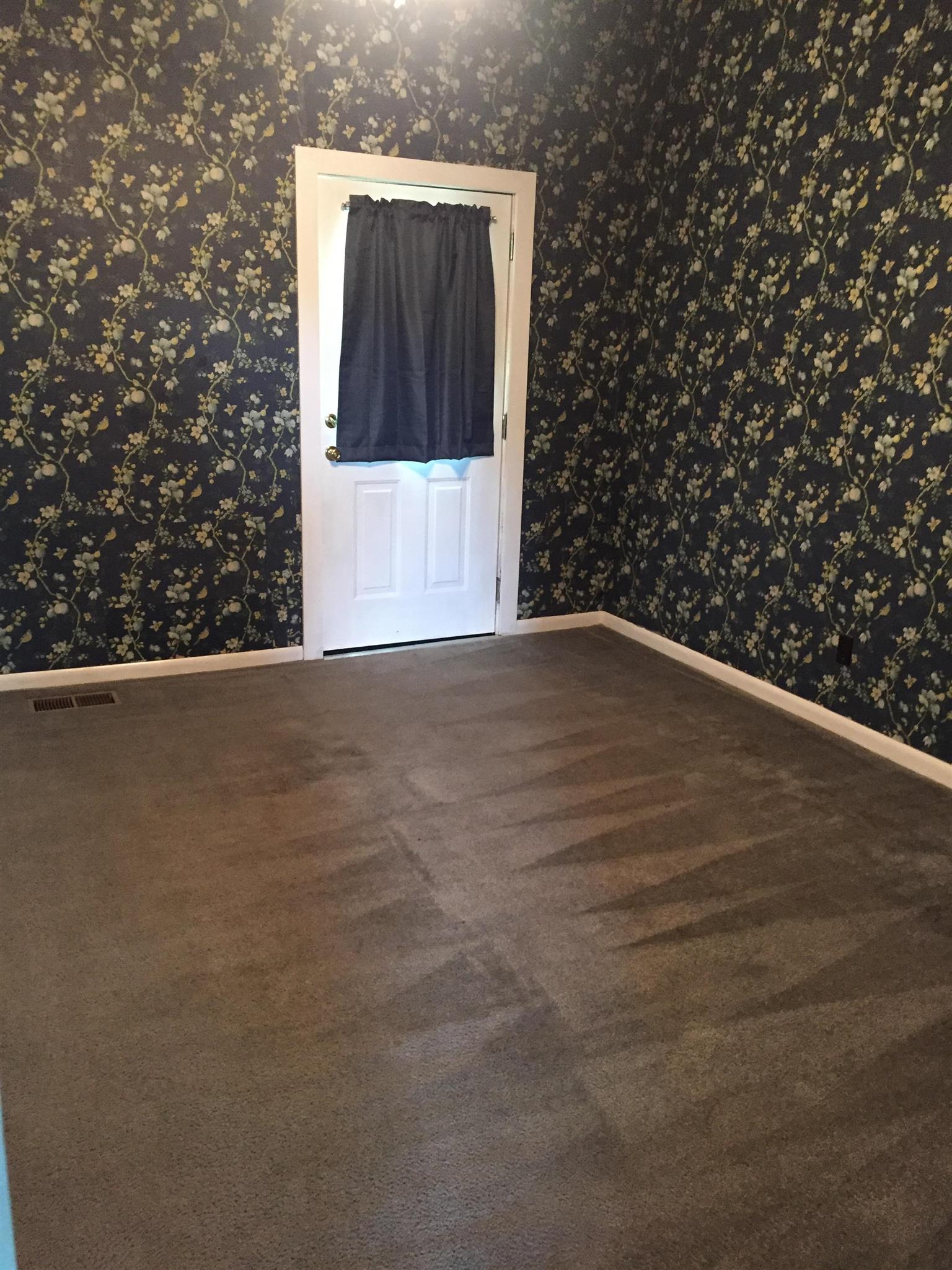 112 2 Valley Road Hendersonville, TN 37075 - Photo 14 of 25 a view of an empty room with a window