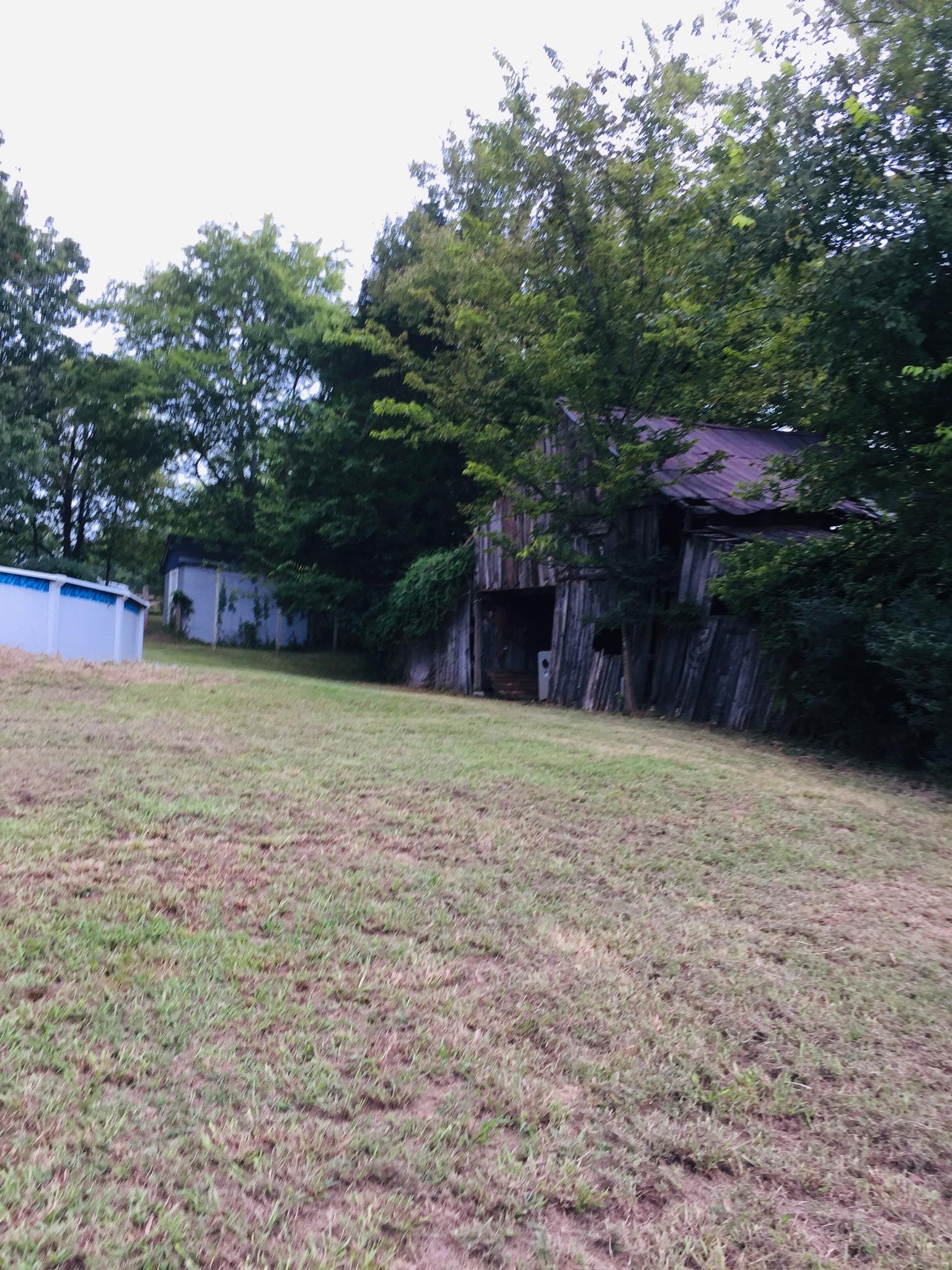 112 2 Valley Road Hendersonville, TN 37075 - Photo 5 of 25 a view of a backyard with a house