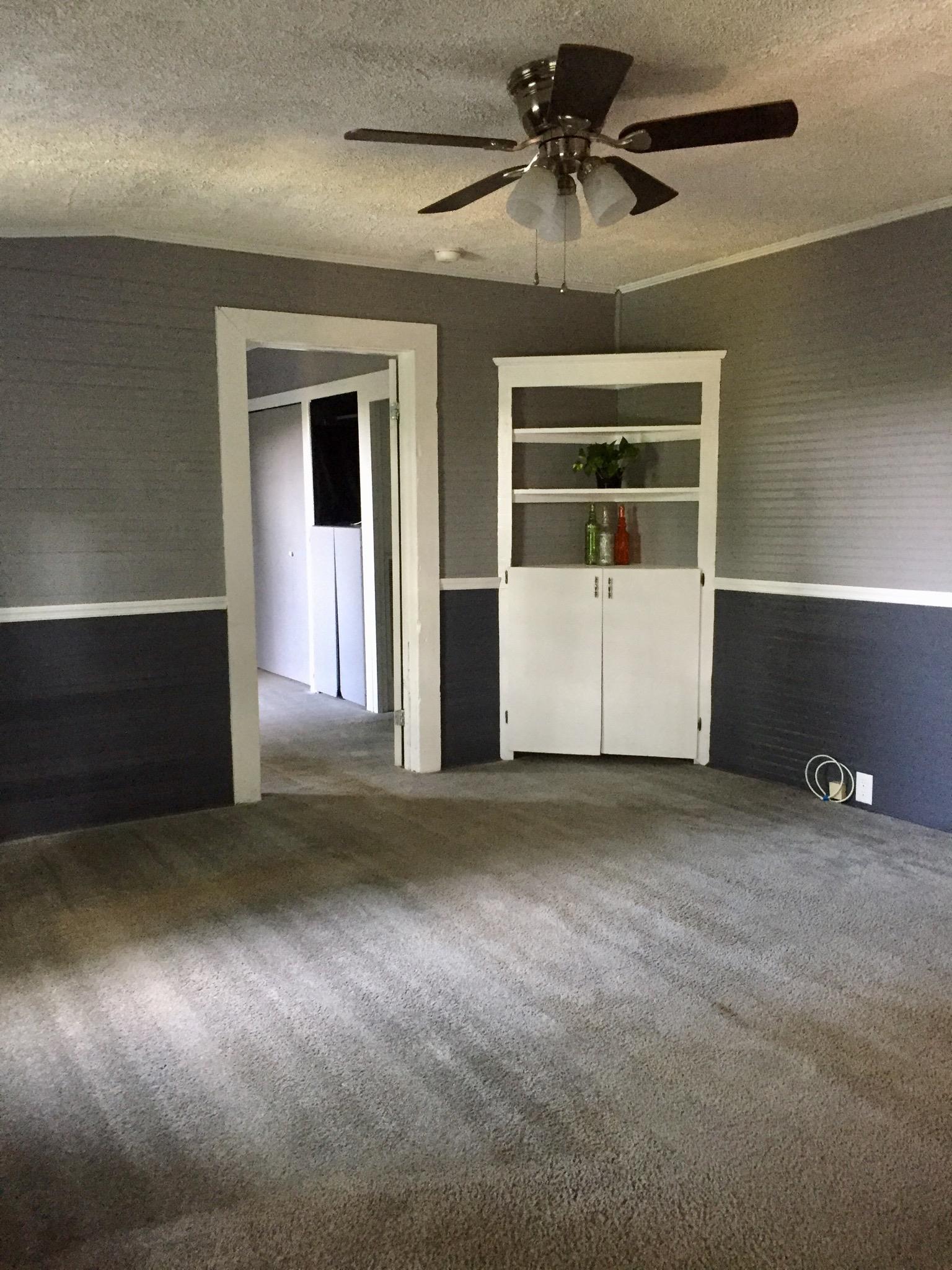112 2 Valley Road Hendersonville, TN 37075 - Photo 9 of 25 a view of an empty room with a window