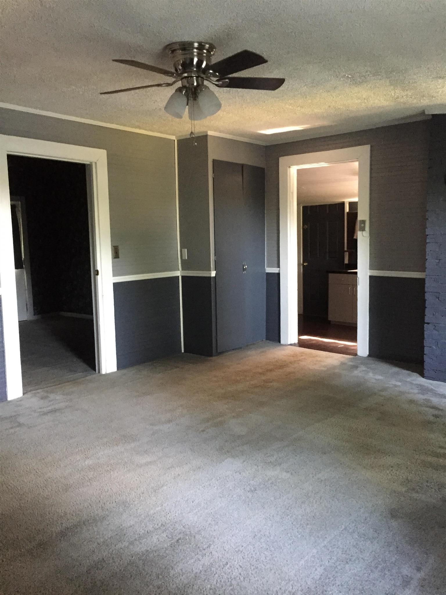 112 2 Valley Road Hendersonville, TN 37075 - Photo 10 of 25 a view of a big room with closet and chandelier fan