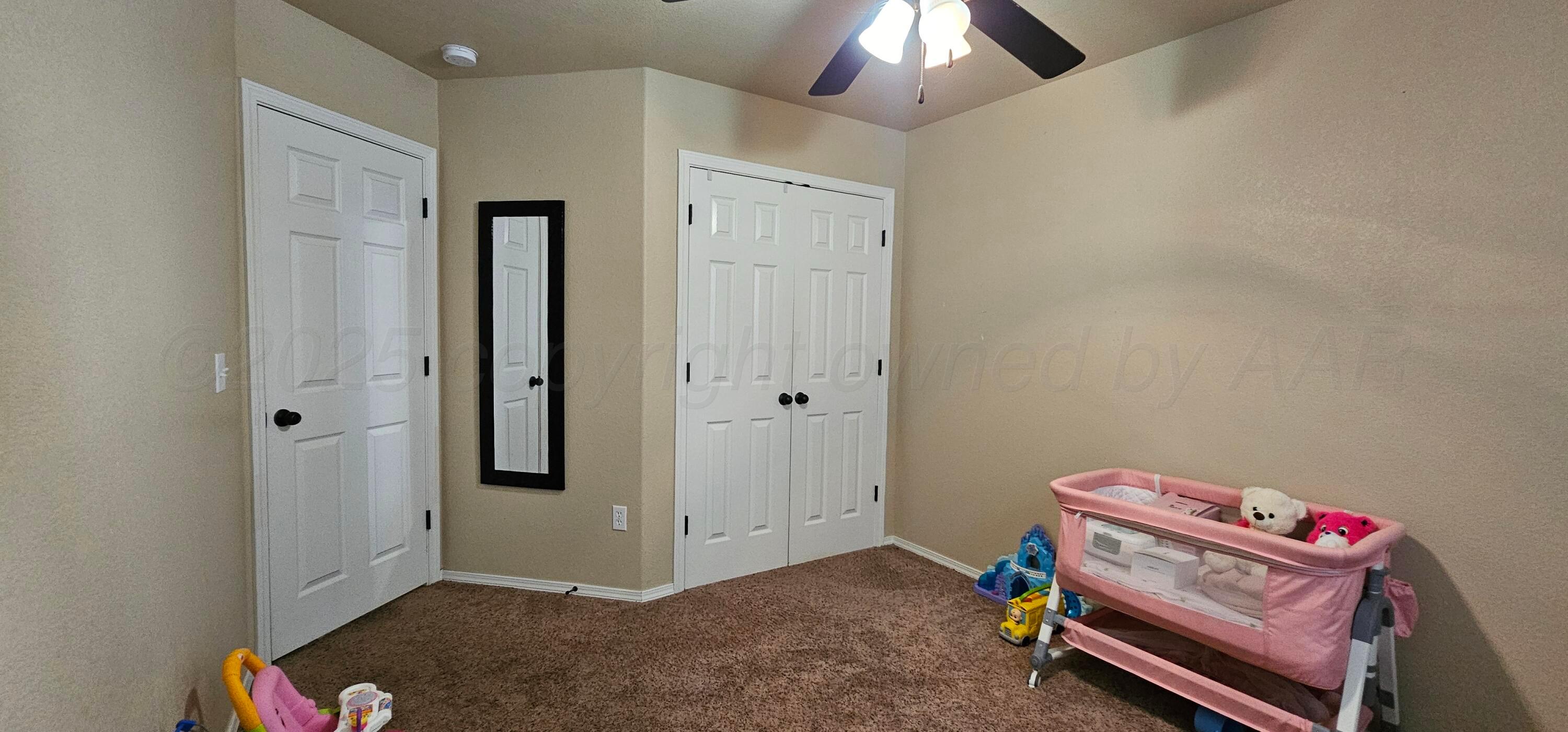 1819 Wagon Trail Road Dalhart, TX 79022 - Photo 11 of 15 a view of room with workspace