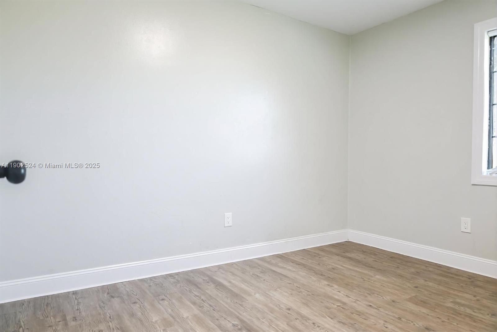 3216 22nd Street Southwest Lehigh Acres, FL 33976 - Photo 12 of 28 a view of an empty room