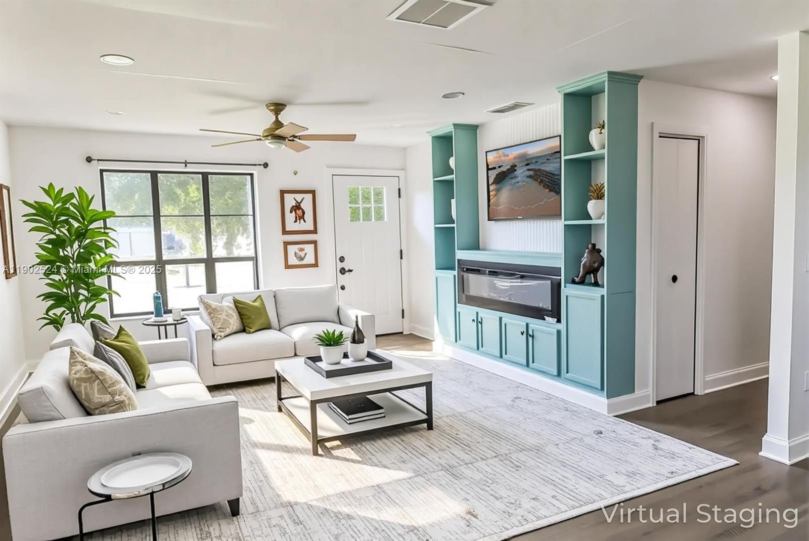 3216 22nd Street Southwest Lehigh Acres, FL 33976 - Photo 3 of 28 a living room with furniture and a fireplace