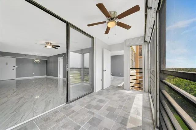 workspace with wooden floor and ceiling fan