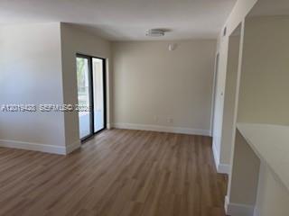 610 South Park Road, Unit 261 Hollywood, FL 33021 - Photo 13 of 13 a view of a room with wooden floor