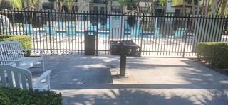 610 South Park Road, Unit 261 Hollywood, FL 33021 - Photo 5 of 13 a view of a gate from a balcony