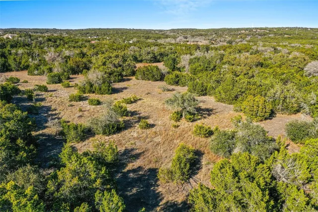 a view of a lake with mountains in the background