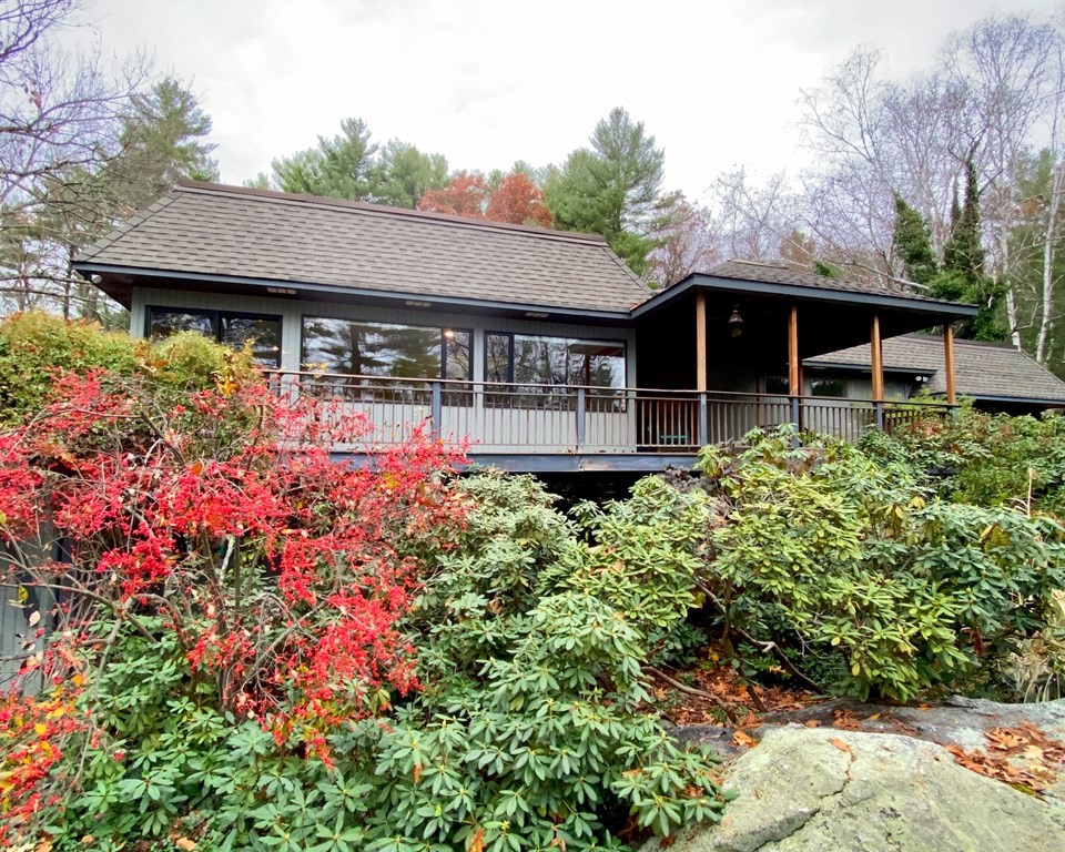 20 Under Pin Hill Road Harvard, MA 01451 - Photo 1 of 41 a view of a house with a flower garden