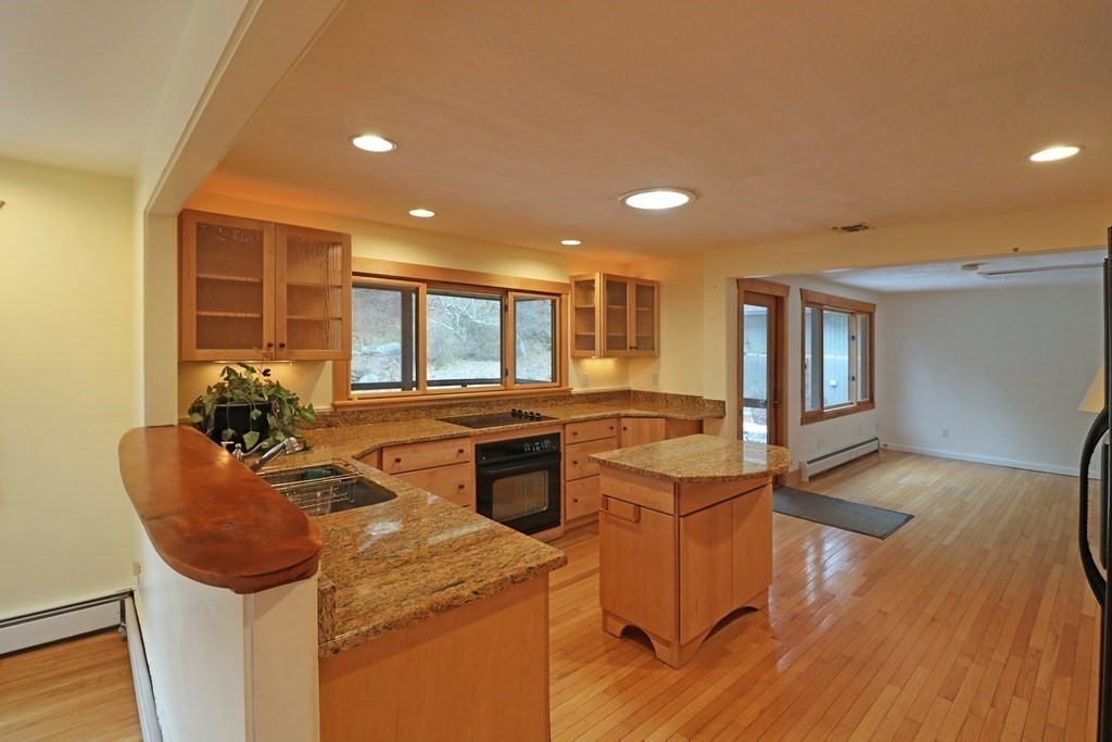 20 Under Pin Hill Road Harvard, MA 01451 - Photo 13 of 41 a view of a kitchen with a sink and cabinets