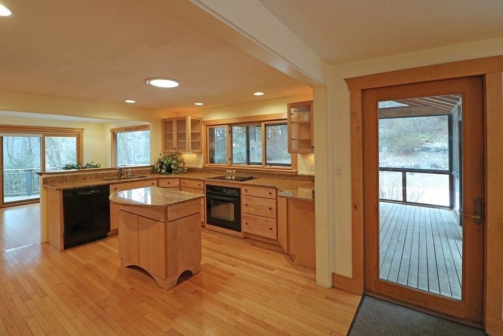 20 Under Pin Hill Road Harvard, MA 01451 - Photo 17 of 41 a kitchen with a sink stove and cabinets