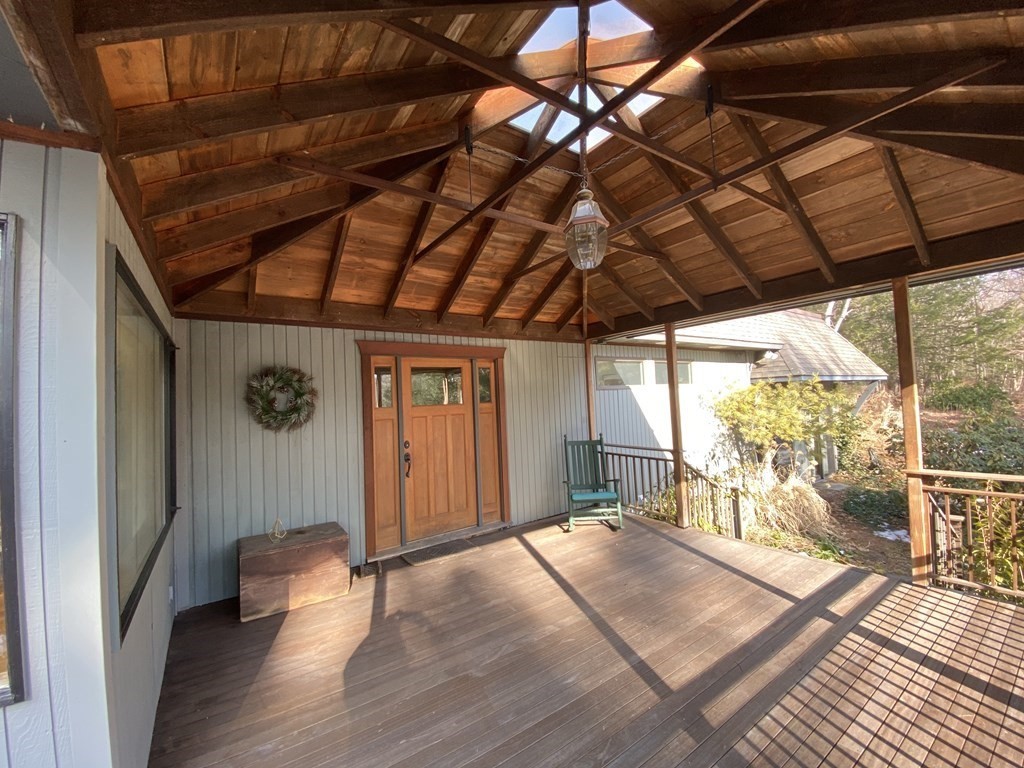 20 Under Pin Hill Road Harvard, MA 01451 - Photo 2 of 41 a view of a room with wooden floor and iron stairs