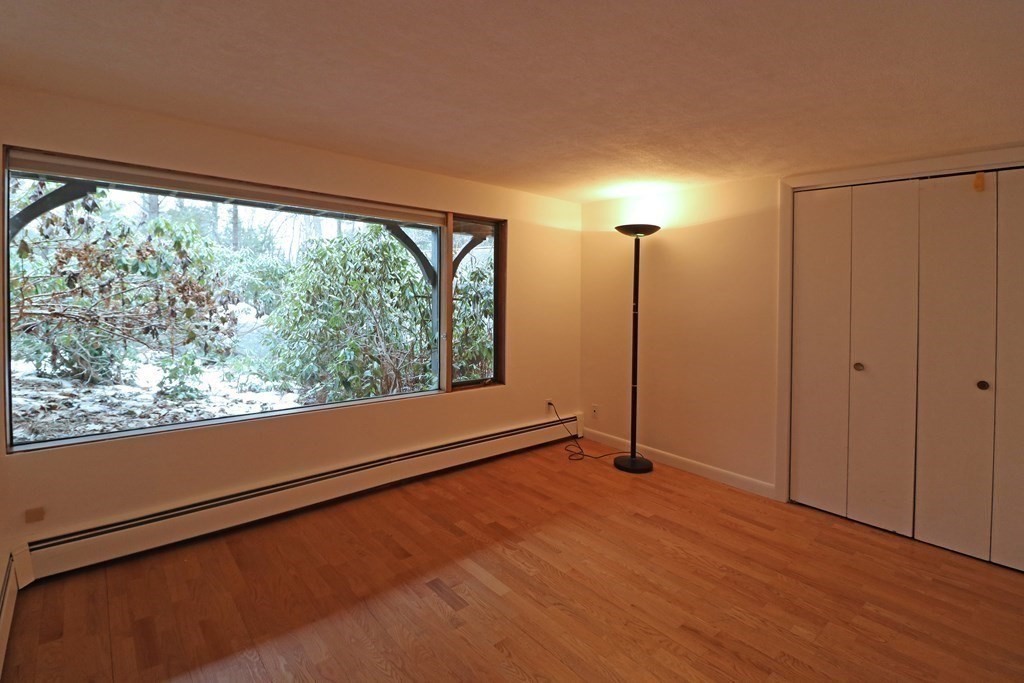 20 Under Pin Hill Road Harvard, MA 01451 - Photo 25 of 41 a view of empty room with wooden floor and fan