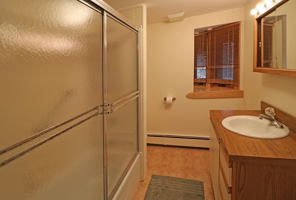 20 Under Pin Hill Road Harvard, MA 01451 - Photo 26 of 41 a bathroom with a sink and shower