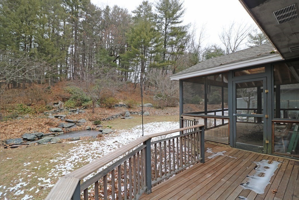 20 Under Pin Hill Road Harvard, MA 01451 - Photo 35 of 41 a view of a wooden deck and a backyard