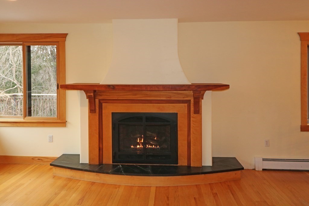 20 Under Pin Hill Road Harvard, MA 01451 - Photo 6 of 41 a living room with a fireplace