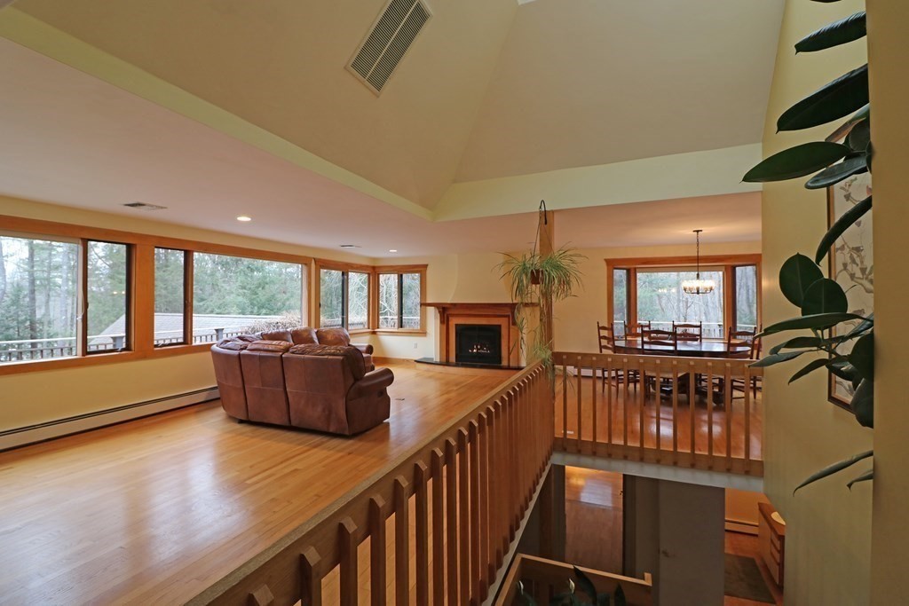 20 Under Pin Hill Road Harvard, MA 01451 - Photo 9 of 41 a living room with furniture and a flat screen tv