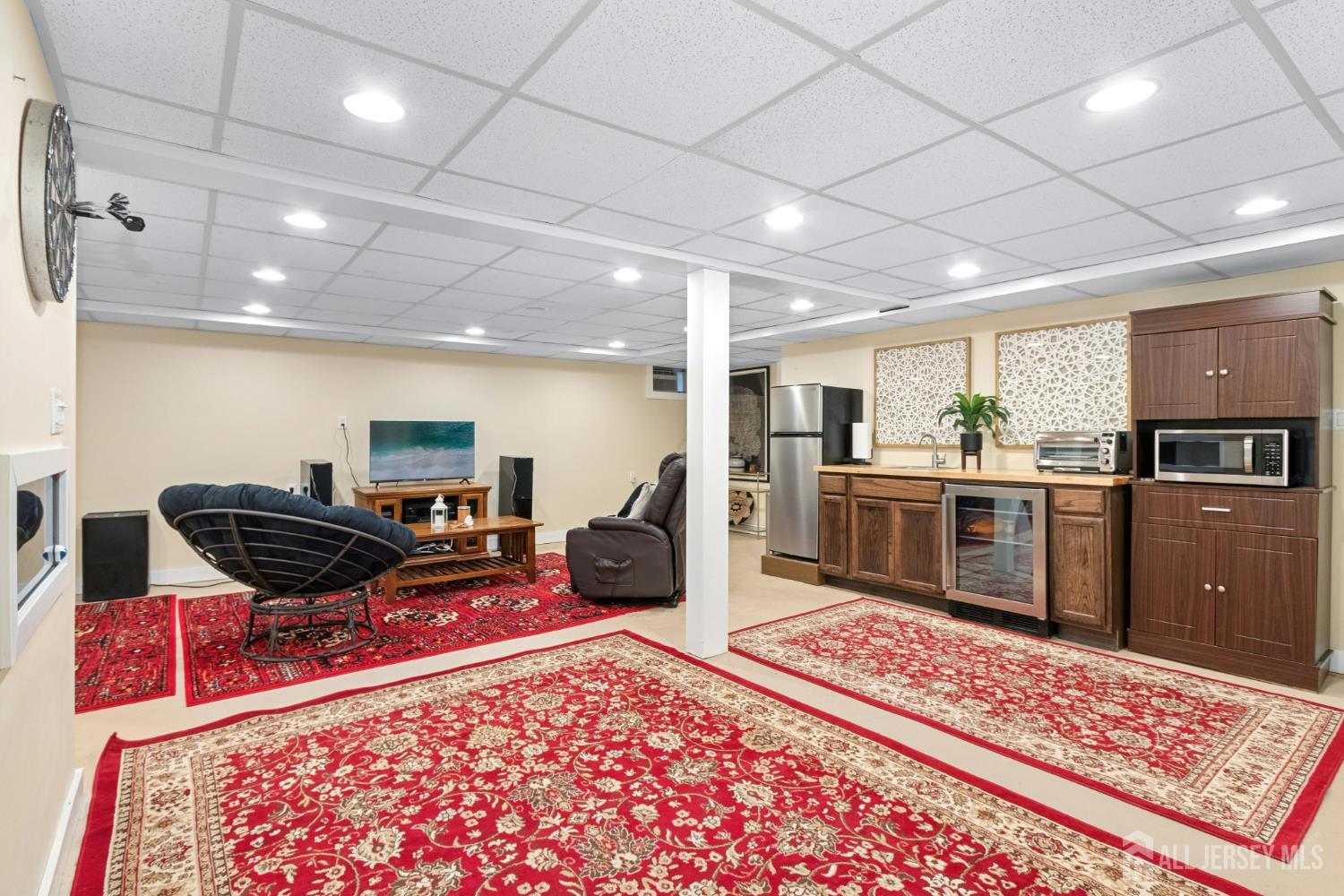 52 Brookside Terrace Clark, NJ 07066 - Photo 15 of 26 a living room with furniture and a rug