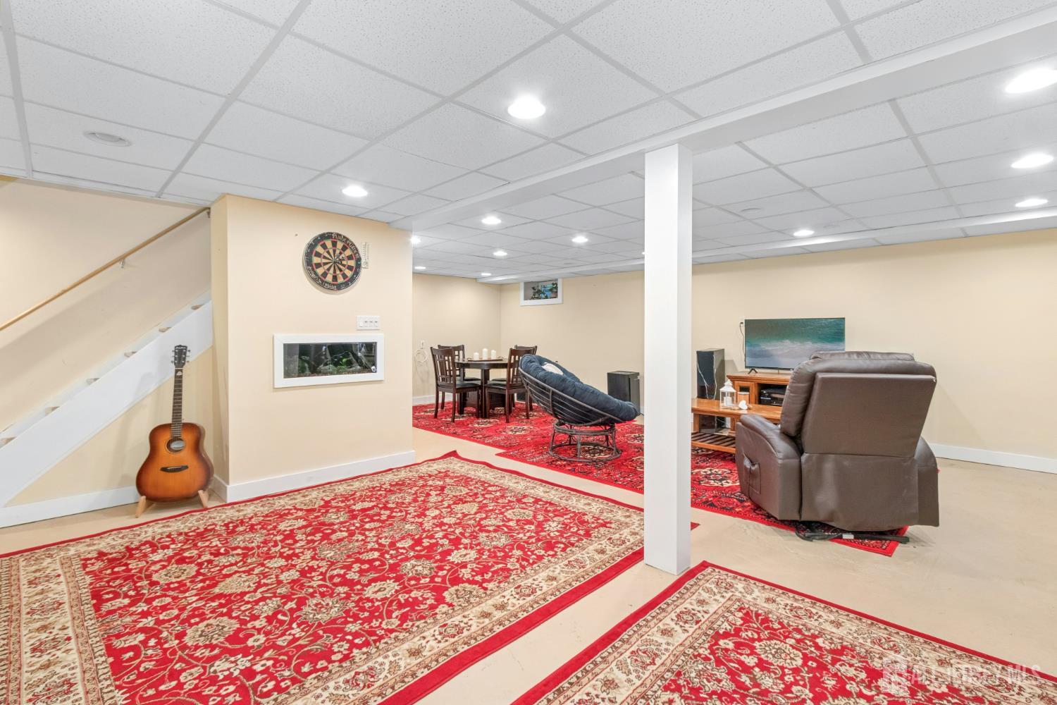 52 Brookside Terrace Clark, NJ 07066 - Photo 16 of 26 a view of a room with furniture and wooden floor