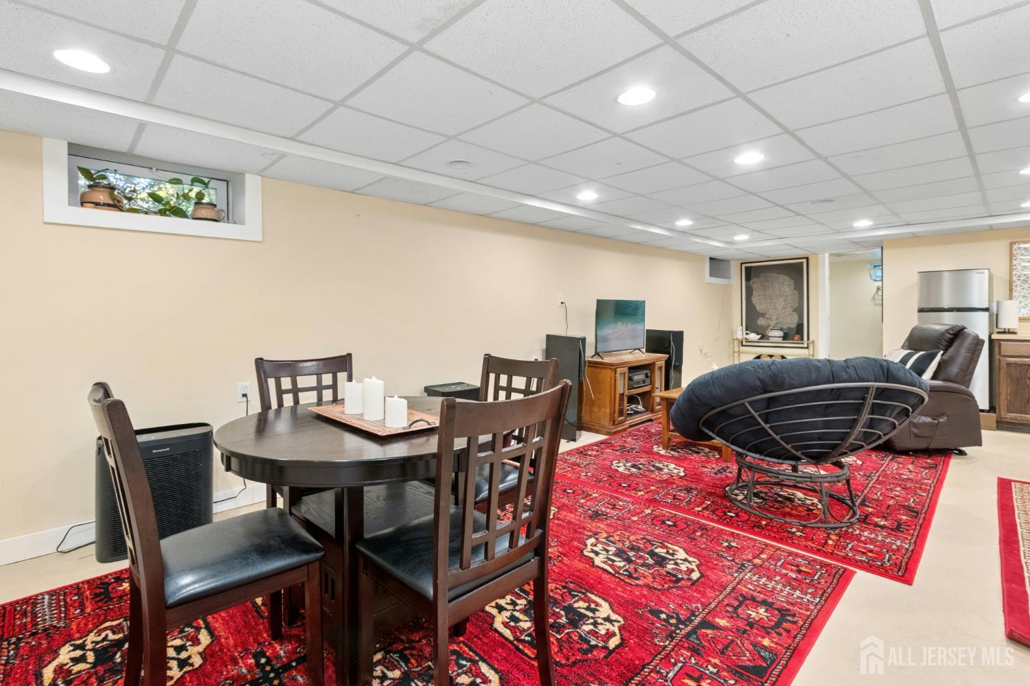 52 Brookside Terrace Clark, NJ 07066 - Photo 17 of 26 a bed room with furniture and a air conditioner vent