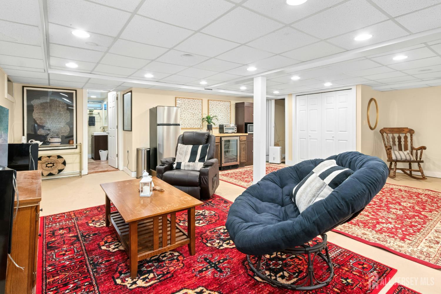 52 Brookside Terrace Clark, NJ 07066 - Photo 19 of 26 a living room with furniture and a rug